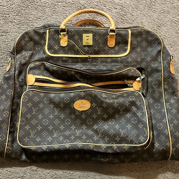 Authentic vintage Louis Vuitton Garment bag/hanger